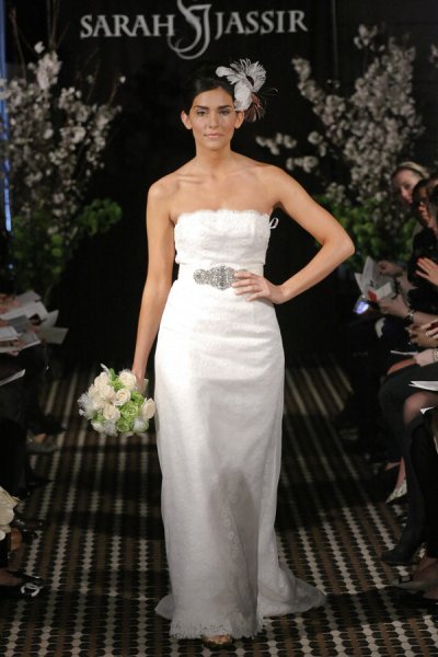 Model walks runway in a Beloved wedding dress by Sarah Jassir, for the Sarah Jassir Fall 2011 - Desire bridal collection.