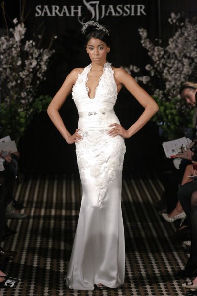 Model walks runway in a Seduction wedding dress by Sarah Jassir, for the Sarah Jassir Fall 2011 - Desire bridal collection.