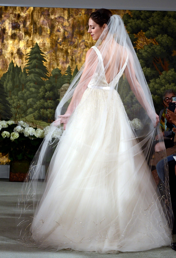 NEW YORK, NY - APRIL 12: A model walks the runway at the Anne Barge Spring 2015 Bridal collection show at The London Hotel on April 12, 2014 in New York City.