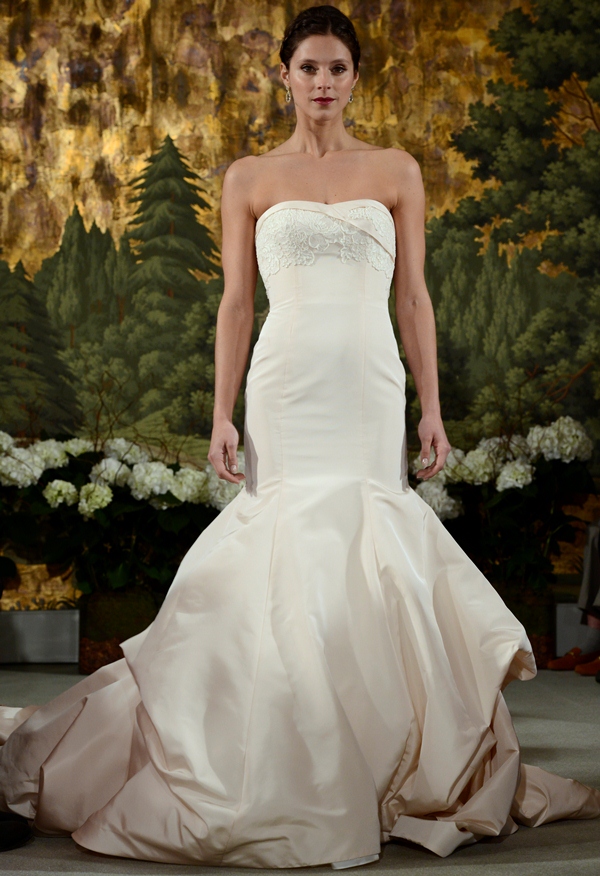 NEW YORK, NY - APRIL 12: A model walks the runway at the Anne Barge Spring 2015 Bridal collection show at The London Hotel on April 12, 2014 in New York City.