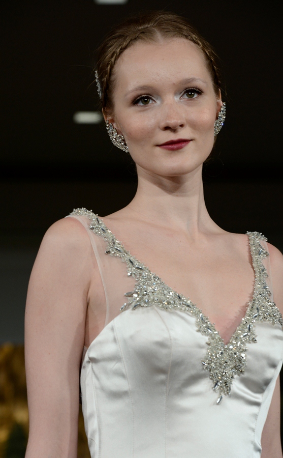 NEW YORK, NY - APRIL 12: A model walks the runway at the Anne Barge Spring 2015 Bridal collection show at The London Hotel on April 12, 2014 in New York City.