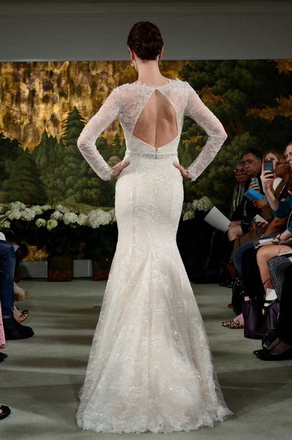 NEW YORK, NY - APRIL 12: A model walks the runway at the Anne Barge Spring 2015 Bridal collection show at The London Hotel on April 12, 2014 in New York City.