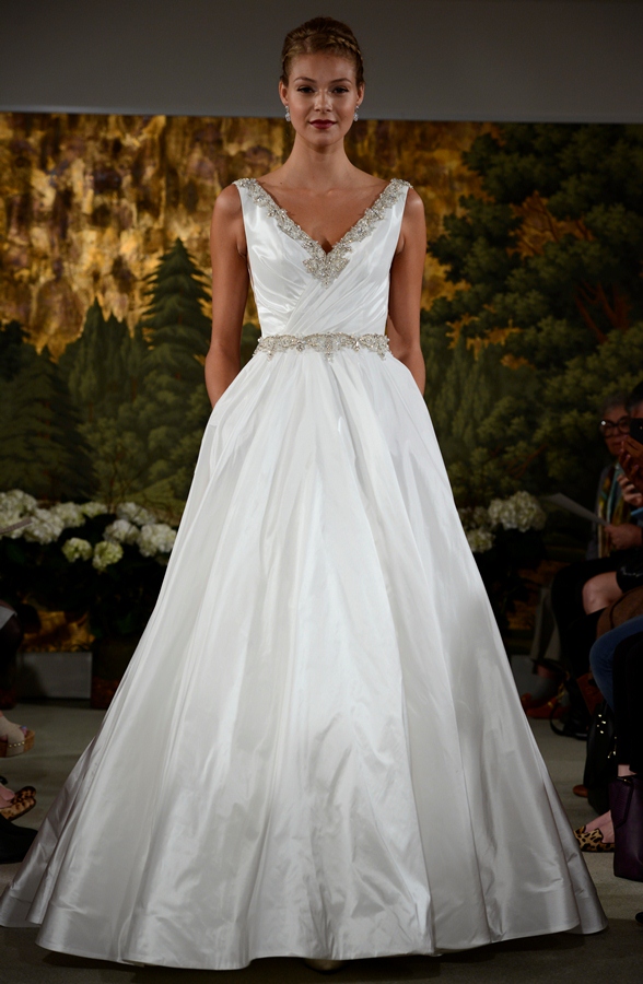 NEW YORK, NY - APRIL 12: A model walks the runway at the Anne Barge Spring 2015 Bridal collection show at The London Hotel on April 12, 2014 in New York City.