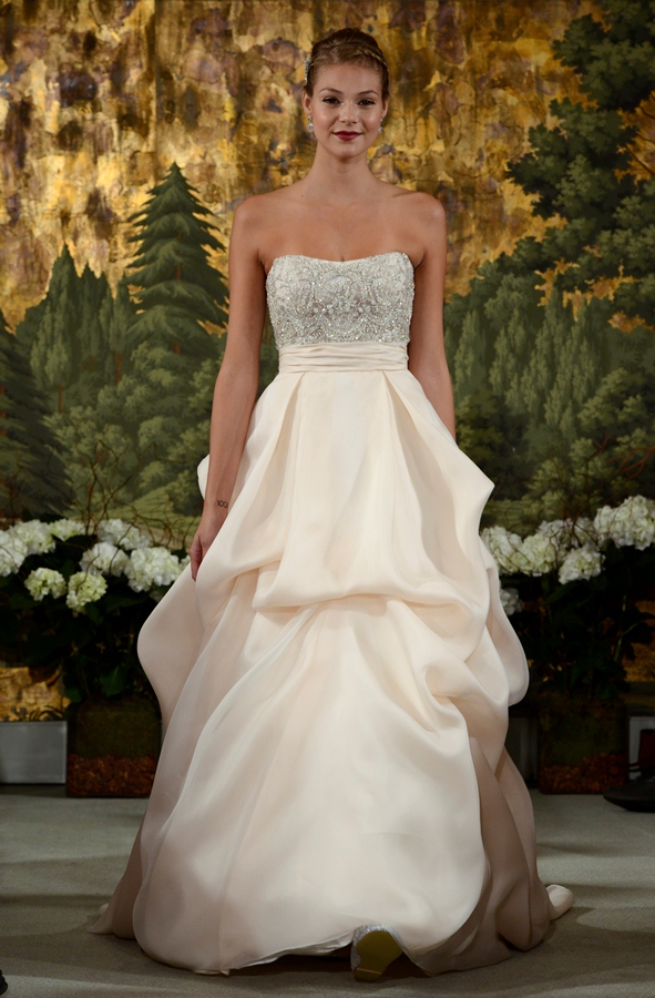 NEW YORK, NY - APRIL 12: A model walks the runway at the Anne Barge Spring 2015 Bridal collection show at The London Hotel on April 12, 2014 in New York City.
