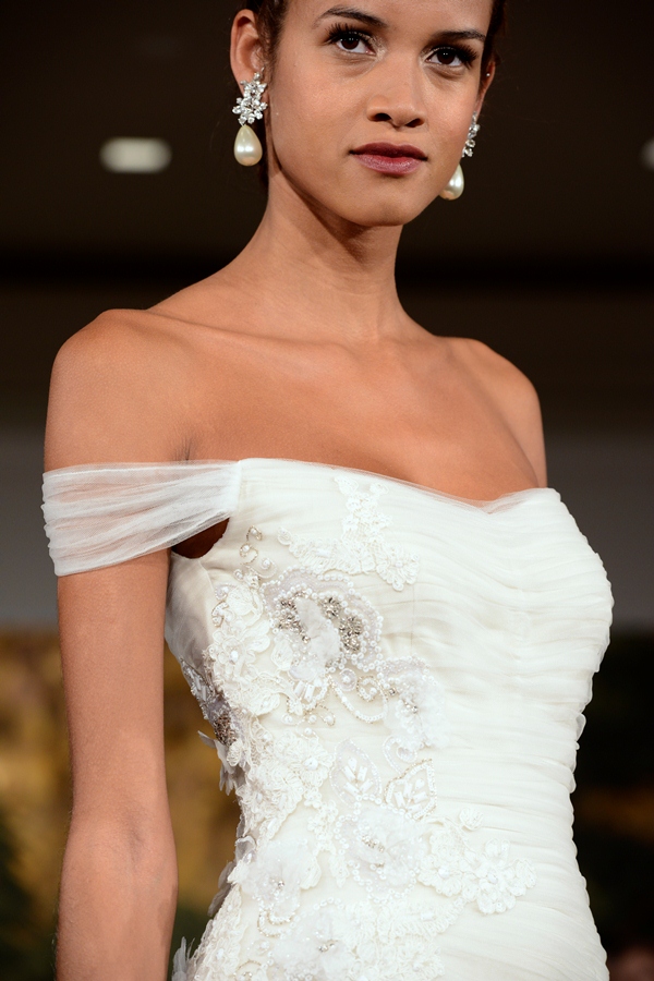 NEW YORK, NY - APRIL 12: A model walks the runway at the Anne Barge Spring 2015 Bridal collection show at The London Hotel on April 12, 2014 in New York City.
