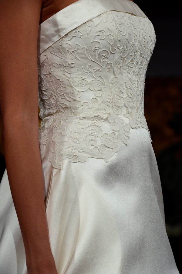 NEW YORK, NY - APRIL 12: A model walks the runway at the Anne Barge Spring 2015 Bridal collection show at The London Hotel on April 12, 2014 in New York City.