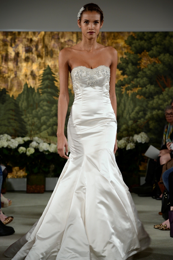 NEW YORK, NY - APRIL 12: A model walks the runway at the Anne Barge Spring 2015 Bridal collection show at The London Hotel on April 12, 2014 in New York City.