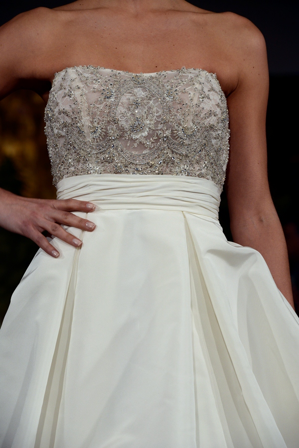 NEW YORK, NY - APRIL 12: A model walks the runway at the Anne Barge Spring 2015 Bridal collection show at The London Hotel on April 12, 2014 in New York City.
