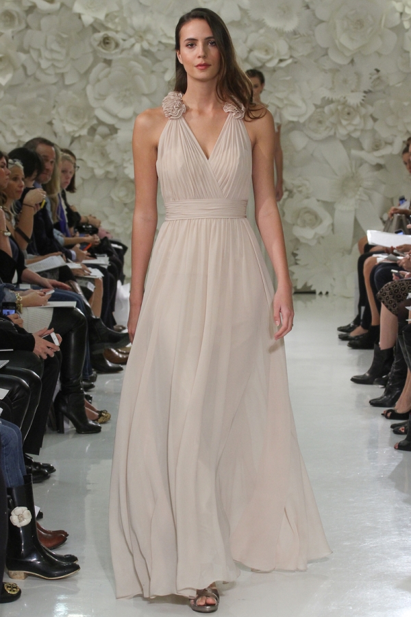 Model walks runway in a WTpp Bridesmaids Spring 2015 gown, by Vatana Watters, for the Watters Spring bridal fashion, at the Couture Show, during New York Bridal Fashion Week Spring 2015.