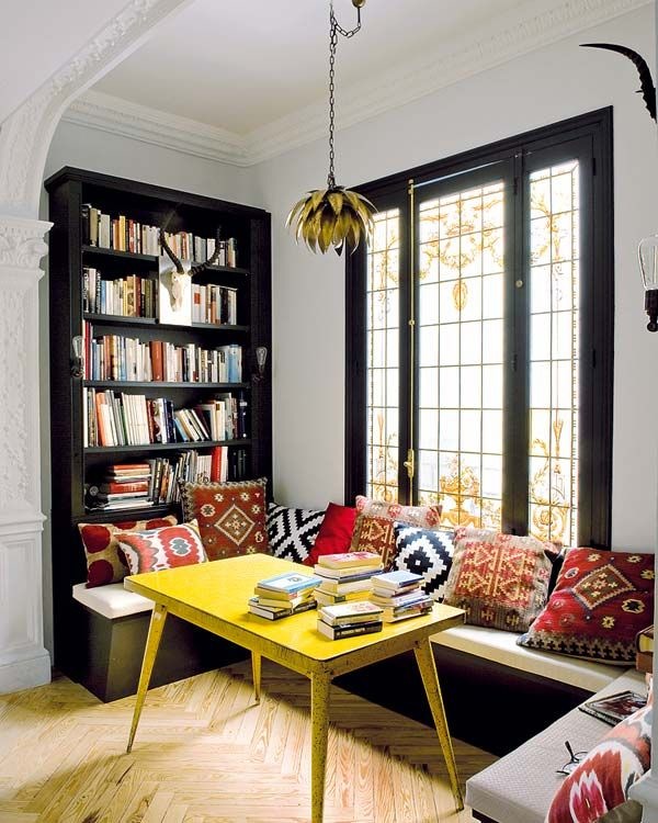 black trimmed windows with yellow table