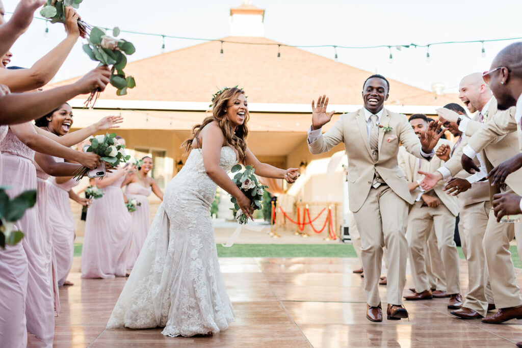 Bride and groom on the dance floor at their rustic wedding having a great time before their first dance!