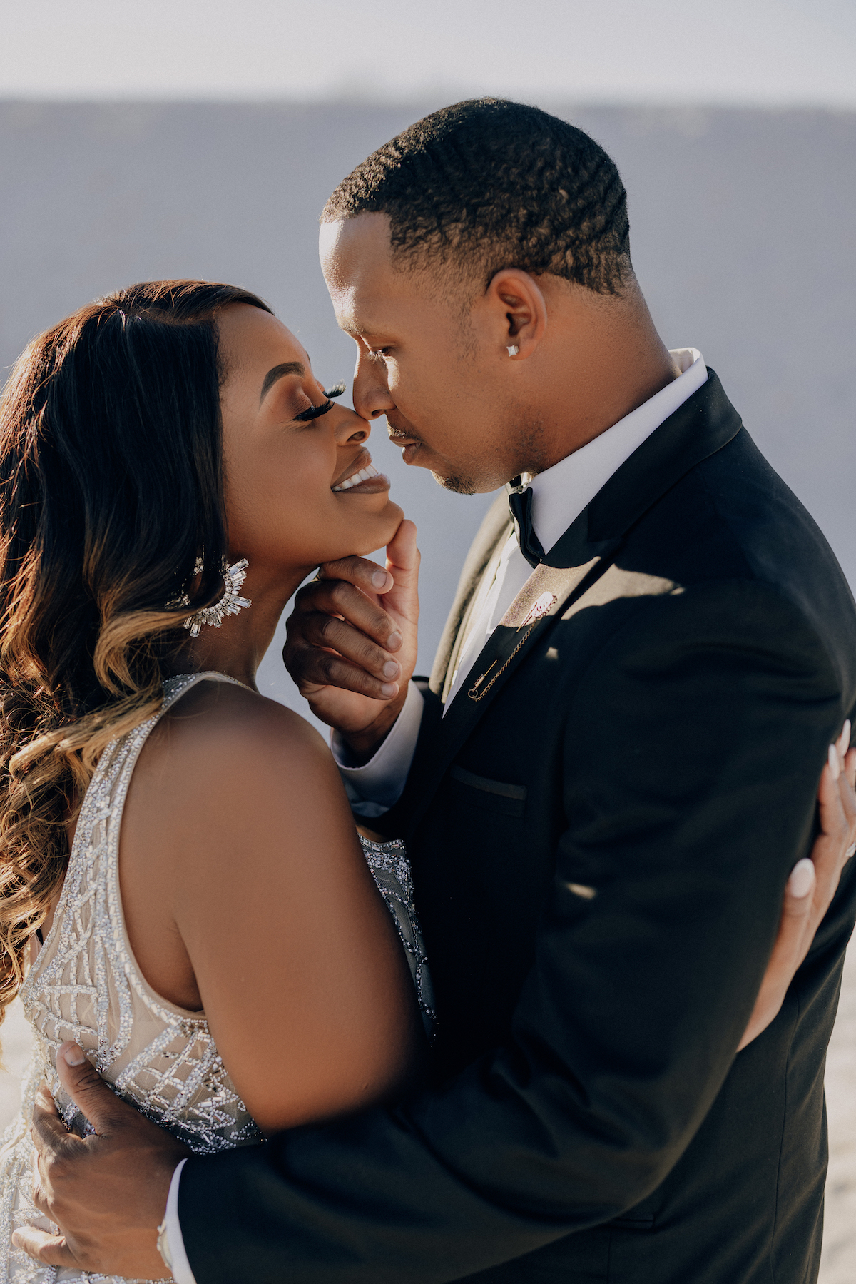 Engaged couple, Larelle Malveaux & JoJuan Cranson, at White Sands New Mexico. Photos by Reem Photography for MunaLuchi Bridal Magazine, Issue No. 26