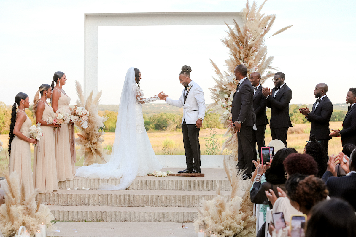 Minimalist boho wedding ceremony in Dripping Springs, Texas