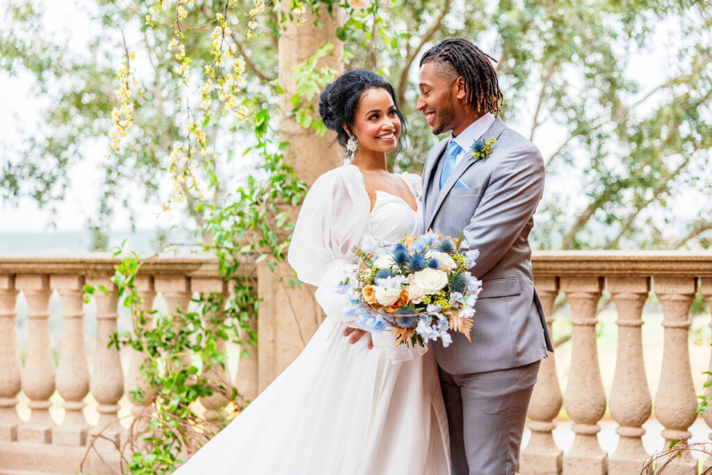 Featured in Issue No. 27, the Bella Collina venue in Central Florida sets the scene for a Tuscany-inspired blue & yellow wedding shoot.