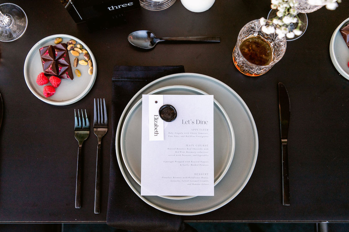 Place setting from Chic noir styled shoot in Toronto Canada