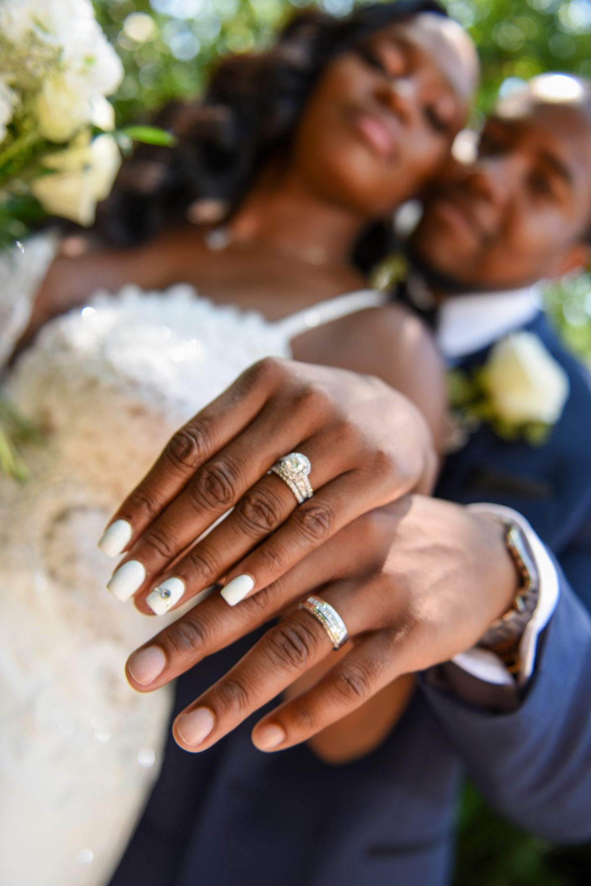 Couple showing off their rings at the somerley at fox hollow