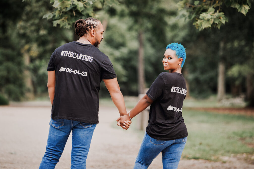 This black excellence-inspired engagement shoot at Great Falls National Park has 3 sexy outfits & blue-dyed natural hair for the bride-to-be.