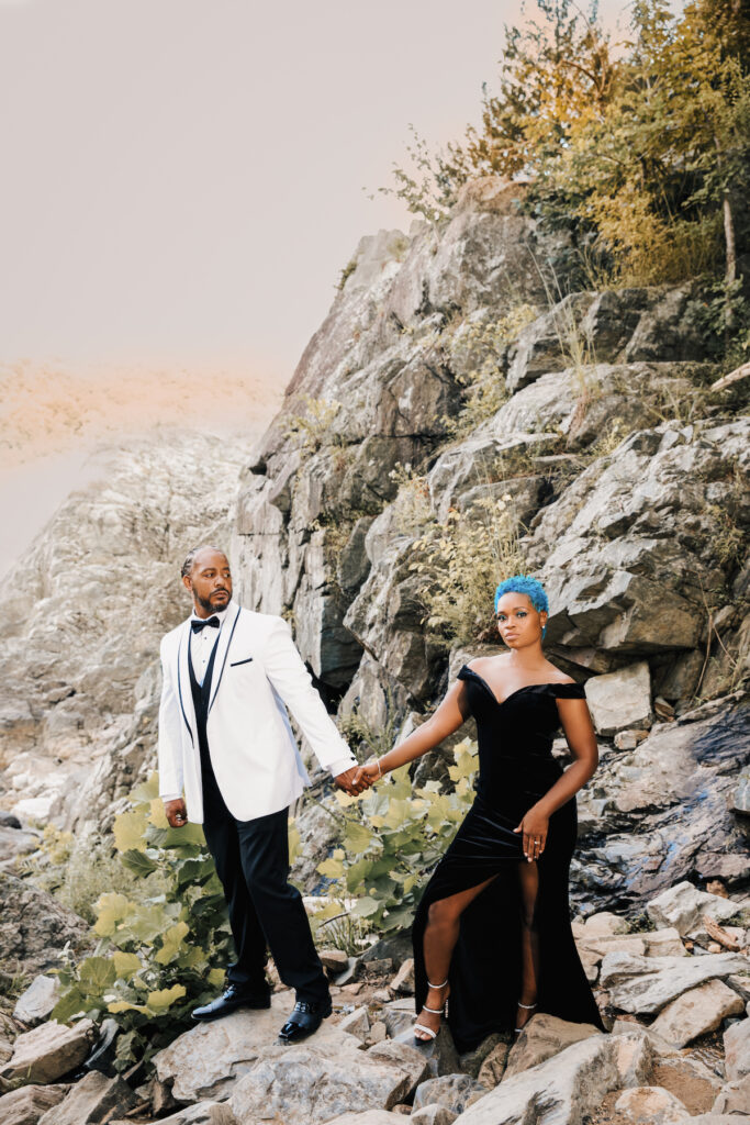 This black excellence-inspired engagement shoot at Great Falls National Park has 3 sexy outfits & blue-dyed natural hair for the bride-to-be.