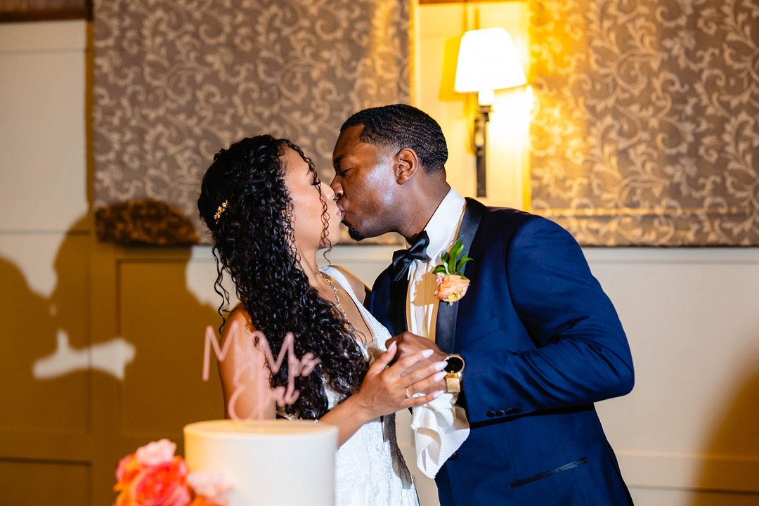 Green pastures, bright florals, a classic red barn, and two glam gowns are highlights of this chic barn wedding in Boston.