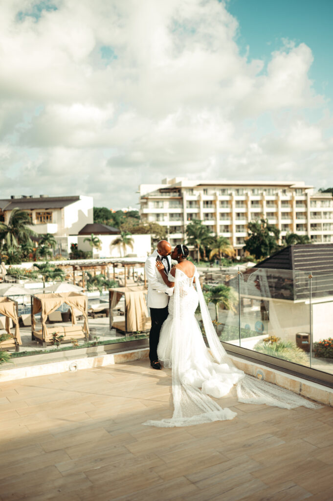 Modern wedding at Royalton Sky Terrace St. Lucia is island luxury at its finest with luscious florals, golden decor, and two luxury gowns.