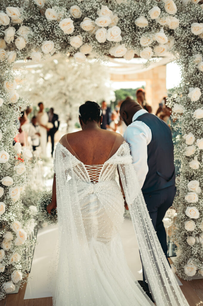 Modern wedding at Royalton Sky Terrace St. Lucia is island luxury at its finest with luscious florals, golden decor, and two luxury gowns.