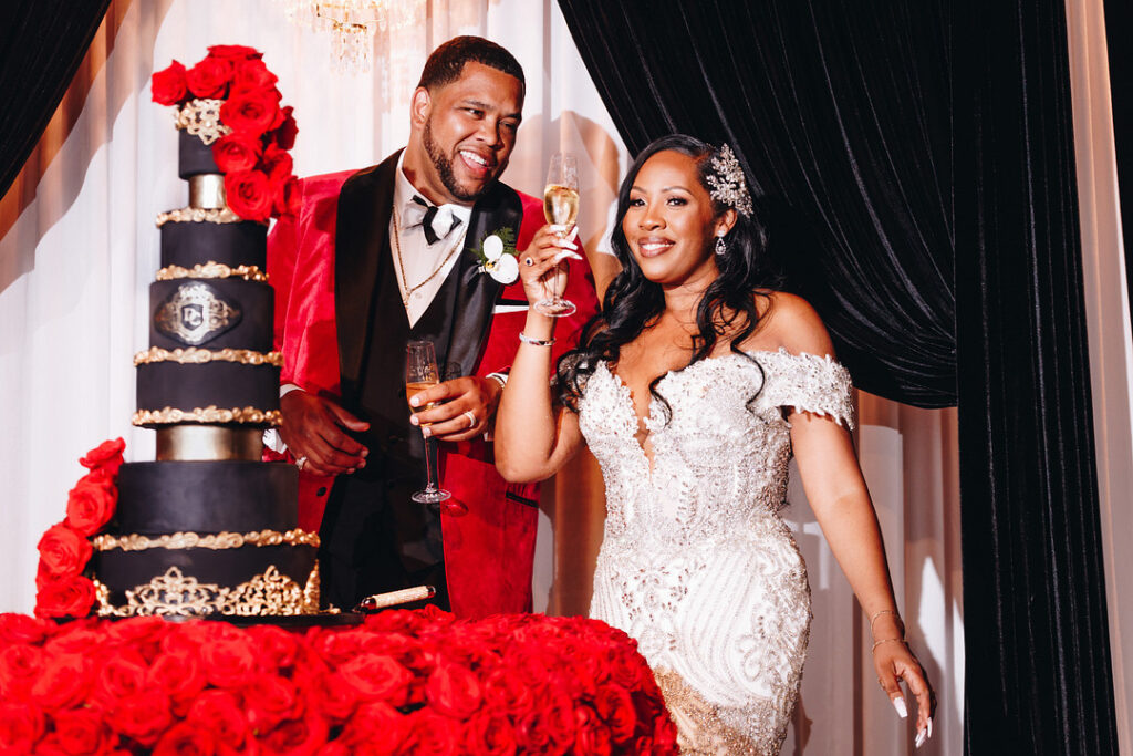 Dayana & Daniel's royal red wedding boasts luscious red florals, adorable flower girls, a dash of Panamá culture, and a decadent black and gold cake.