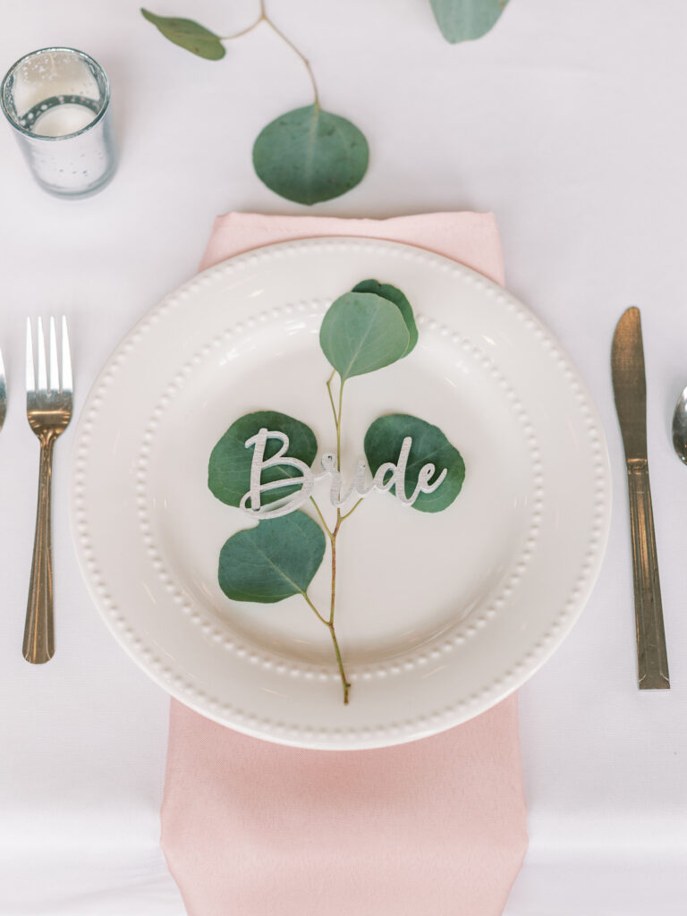 Pastel pink and mauve hues, a sleek modern gown, and a rustic chic venue at Ashton Hill Farm are just a few details from this adorable wedding in Iowa.