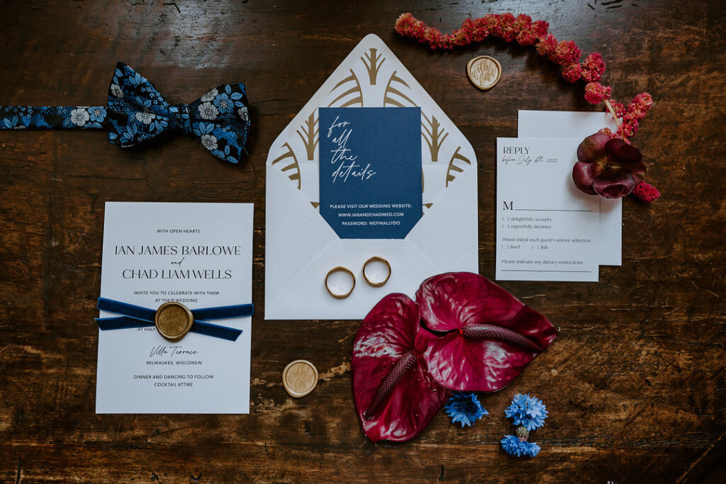 This fairytale garden-inspired styled shoot in Wisconsin highlights the LGBTQ+ community with bold jewel-tone decor and luscious floral art.  