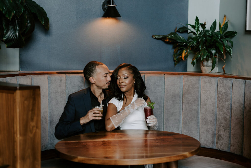 Classy engagement session in uptown Charlotte, North Carolina, takes us on a steamy walkabout in the city from Idlewild Bar to City Hall. 