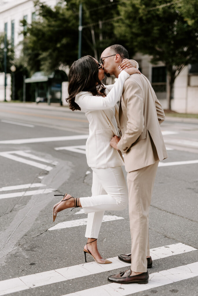 Classy engagement session in uptown Charlotte, North Carolina, takes us on a steamy walkabout from Idlewild Bar to City Hall.