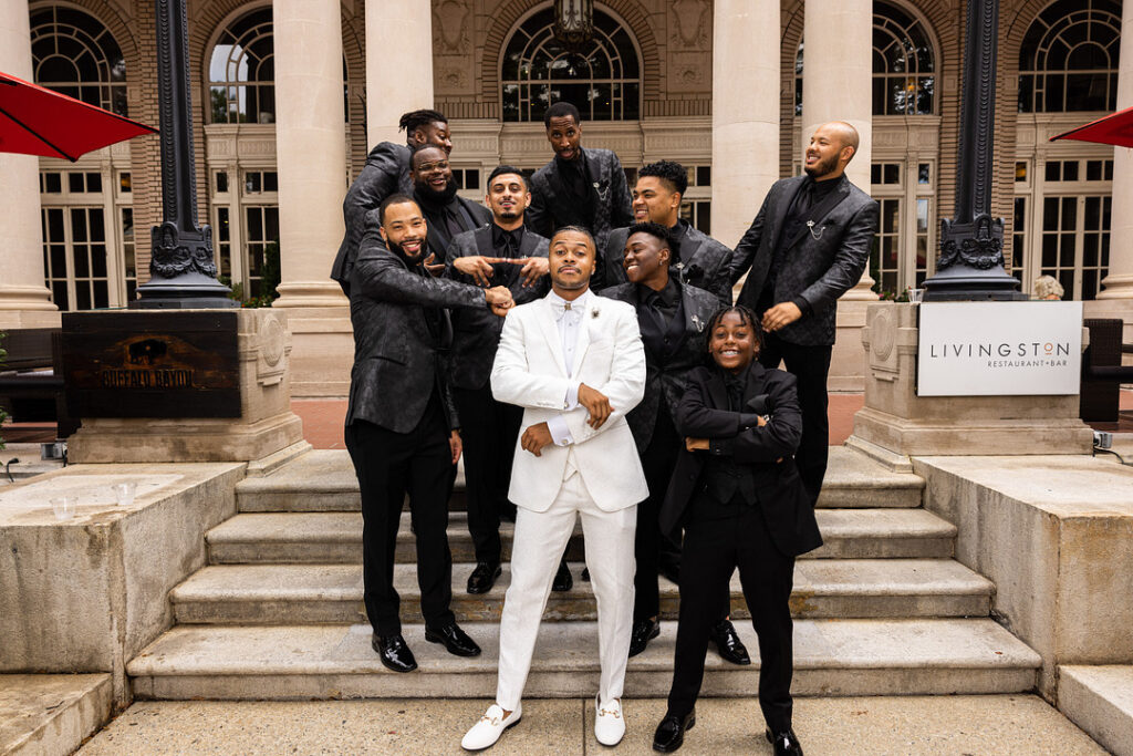 Everyone but the bride and groom wore black in this classic meets modern wedding at the Georgian Terrace Hotel in Atlanta, Georgia.