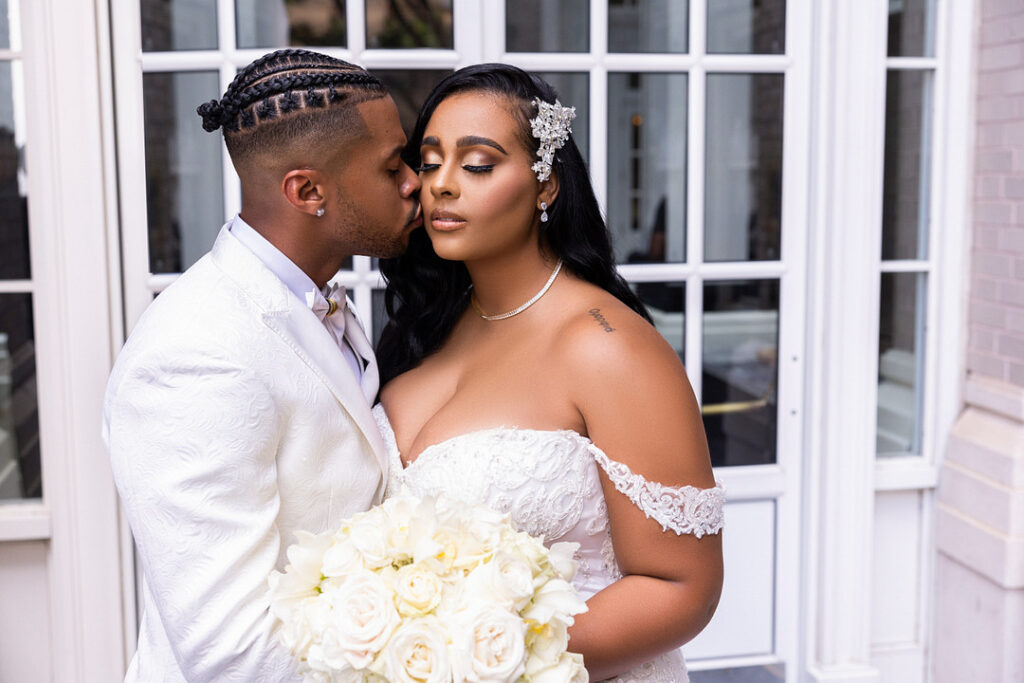 Everyone but the bride and groom wore black in this classic meets modern wedding at the Georgian Terrace Hotel in Atlanta, Georgia.