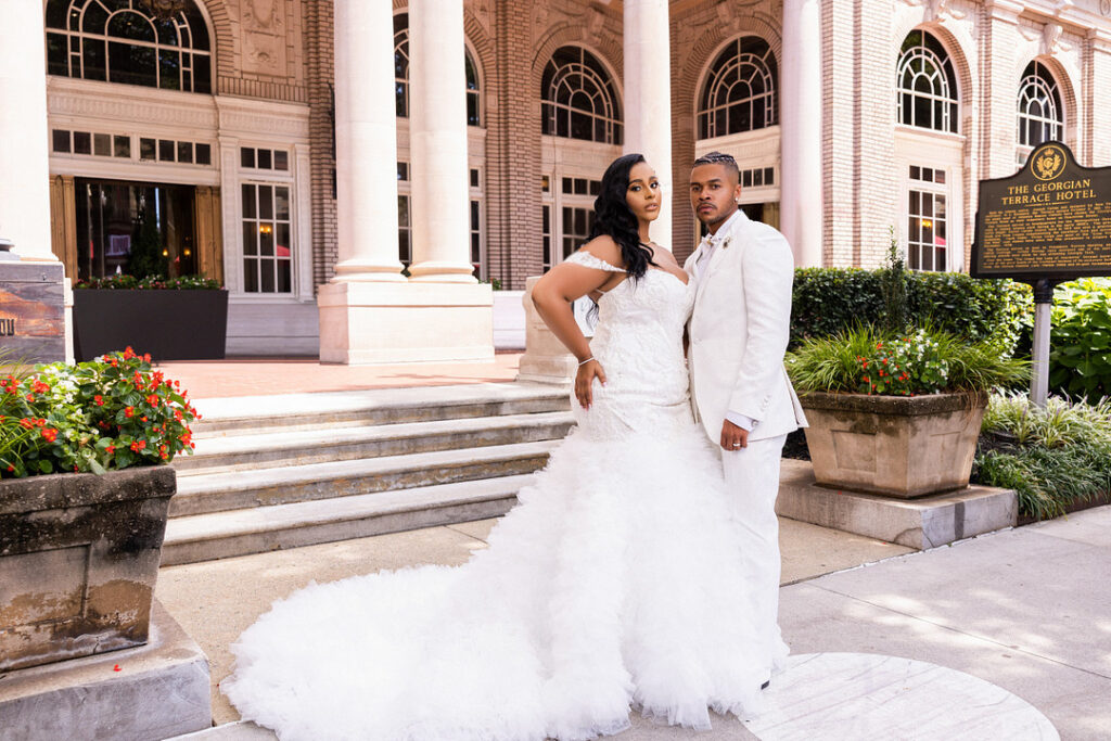 Everyone but the bride and groom wore black in this classic meets modern wedding at the Georgian Terrace Hotel in Atlanta, Georgia.