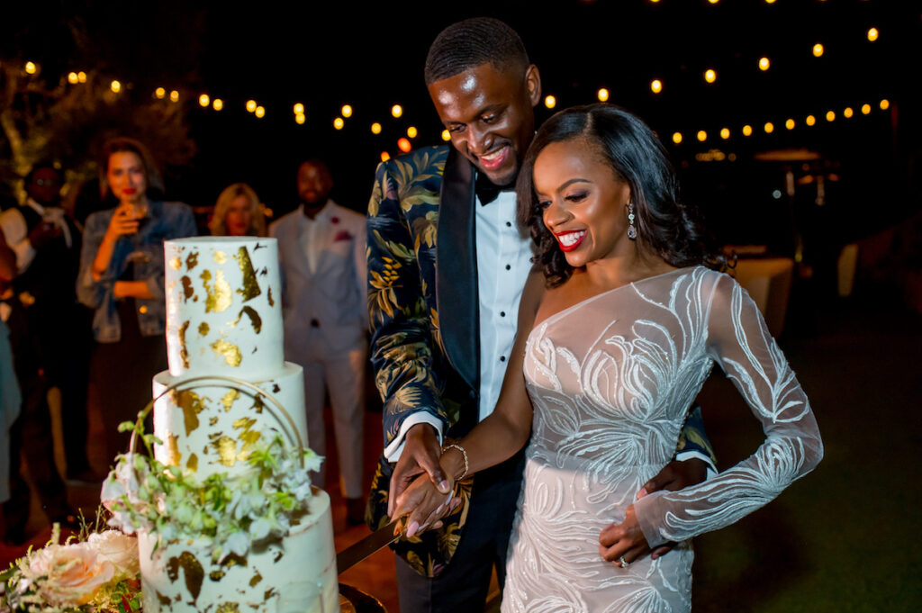 This hilltop vineyard wedding in Malibu is everything sweet with a sunset-inspired color story, an outdoor ceremony, and two glam dresses!