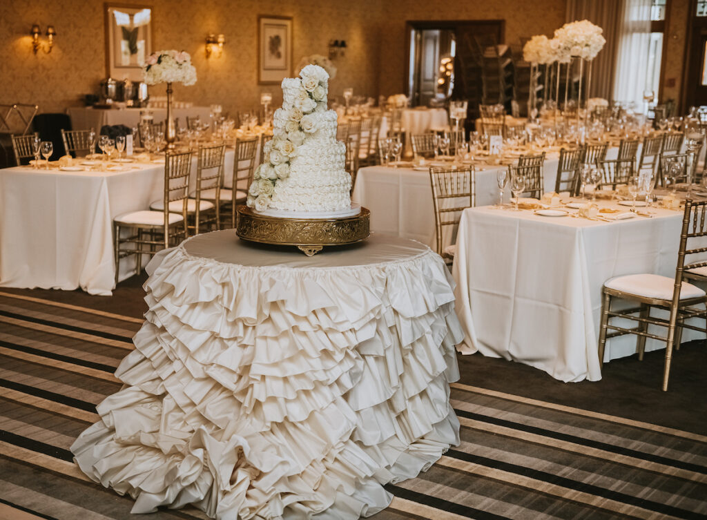 Mixing vintage and modern design, Christian and Leevy’s elegant autumn wedding features a cream and gold color palette and dramatic details.