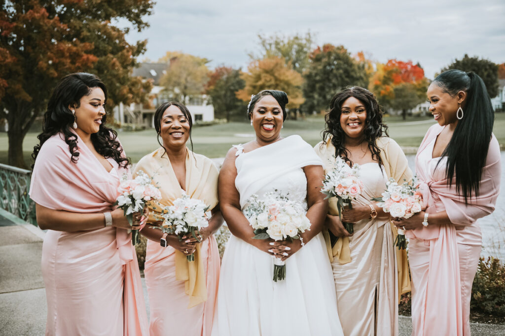 Mixing vintage and modern design, Christian and Leevy’s elegant autumn wedding features a cream and gold color palette and dramatic details.