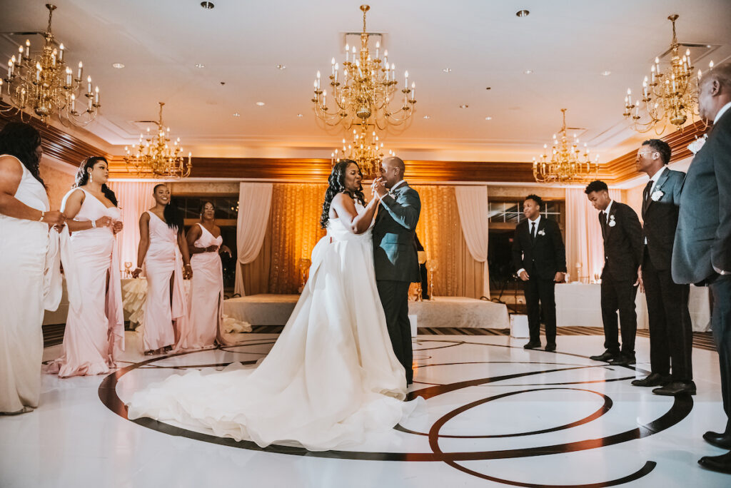 Mixing vintage and modern design, Christian and Leevy’s elegant autumn wedding features a cream and gold color palette and dramatic details.