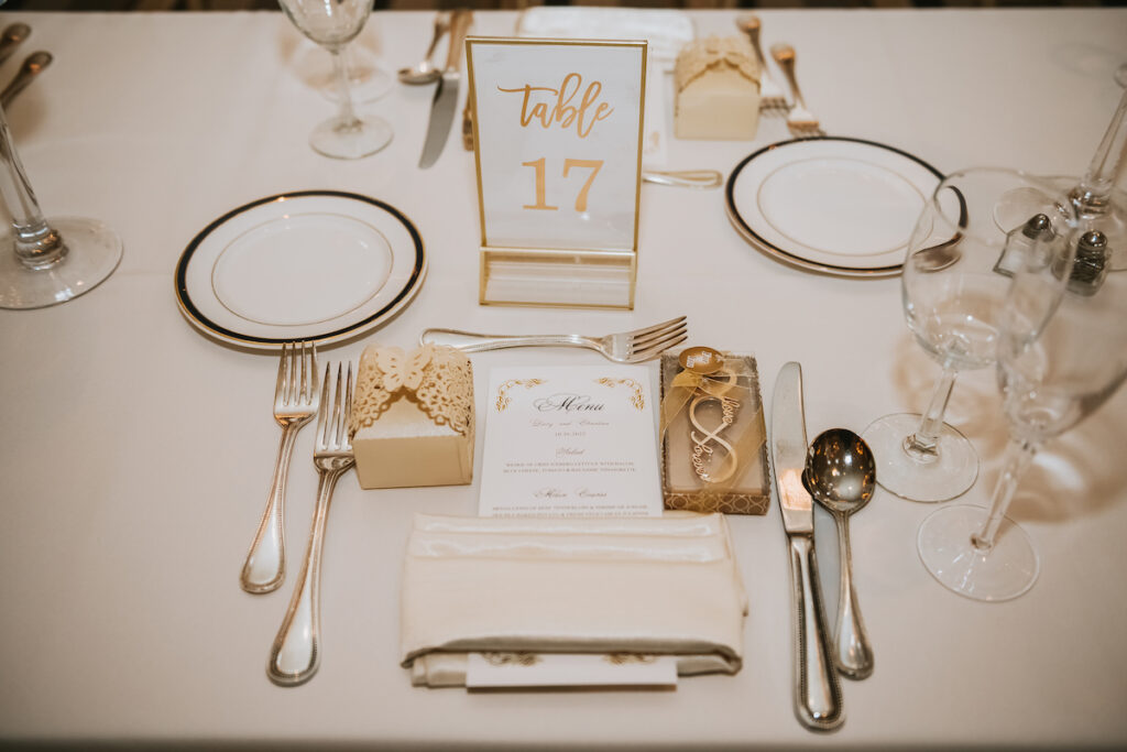 Mixing vintage and modern design, Christian and Leevy’s elegant autumn wedding features a cream and gold color palette and dramatic details.