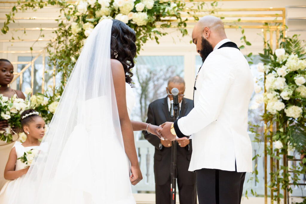 Antonette and Jermel celebrated their long-time love with a luxe white and gold wedding at a modern venue in New Jersey!