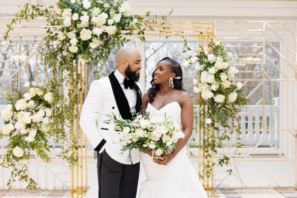 Antonette and Jermel celebrated their long-time love with a luxe white and gold wedding at a modern venue in New Jersey!