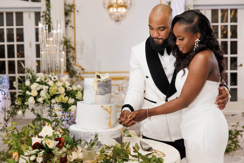 Antonette and Jermel celebrated their long-time love with a luxe white and gold wedding at a modern venue in New Jersey!