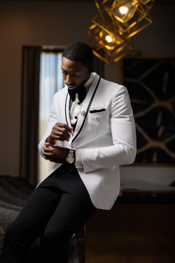Amp & Asia's stunning black and white wedding at the 701 Whaley in Columbia, South Carolina, exudes classic elegance.