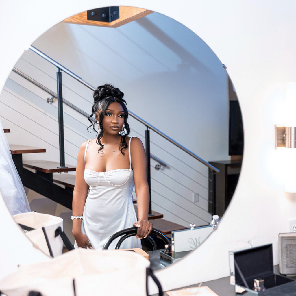 Amp & Asia's stunning black and white wedding at the 701 Whaley in Columbia, South Carolina, exudes classic elegance.