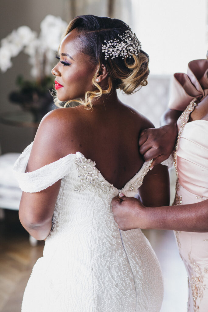 Abigail and Ramon's regal fairytale wedding featured all-white florals, refined decor, and an exquisite venue!