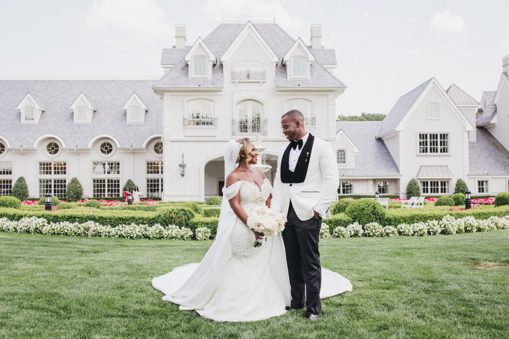 Abigail and Ramon's regal fairytale wedding featured all-white florals, refined decor, and an exquisite venue!
