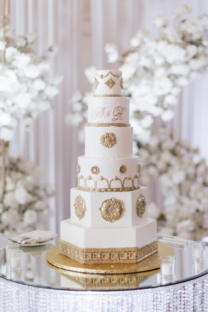 Abigail and Ramon's regal fairytale wedding featured all-white florals, refined decor, and an exquisite venue!