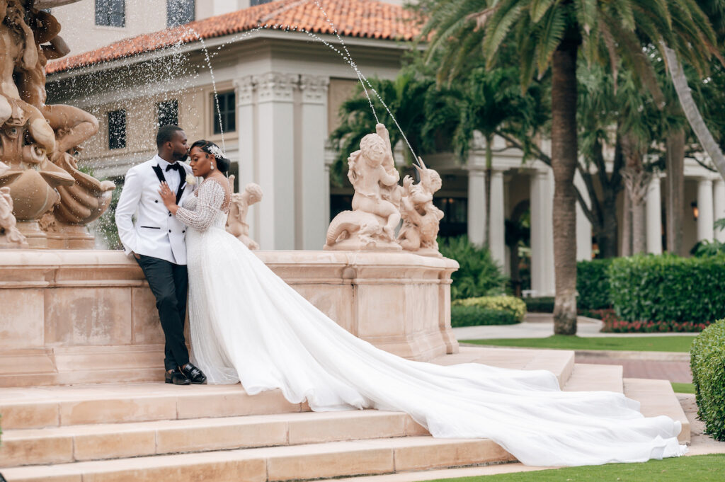 Featured in MunaLuchi Bride, Issue 28, Crystal & Joshua Foster said I-do in a glamorous royal-inspired wedding week at The Breakers.