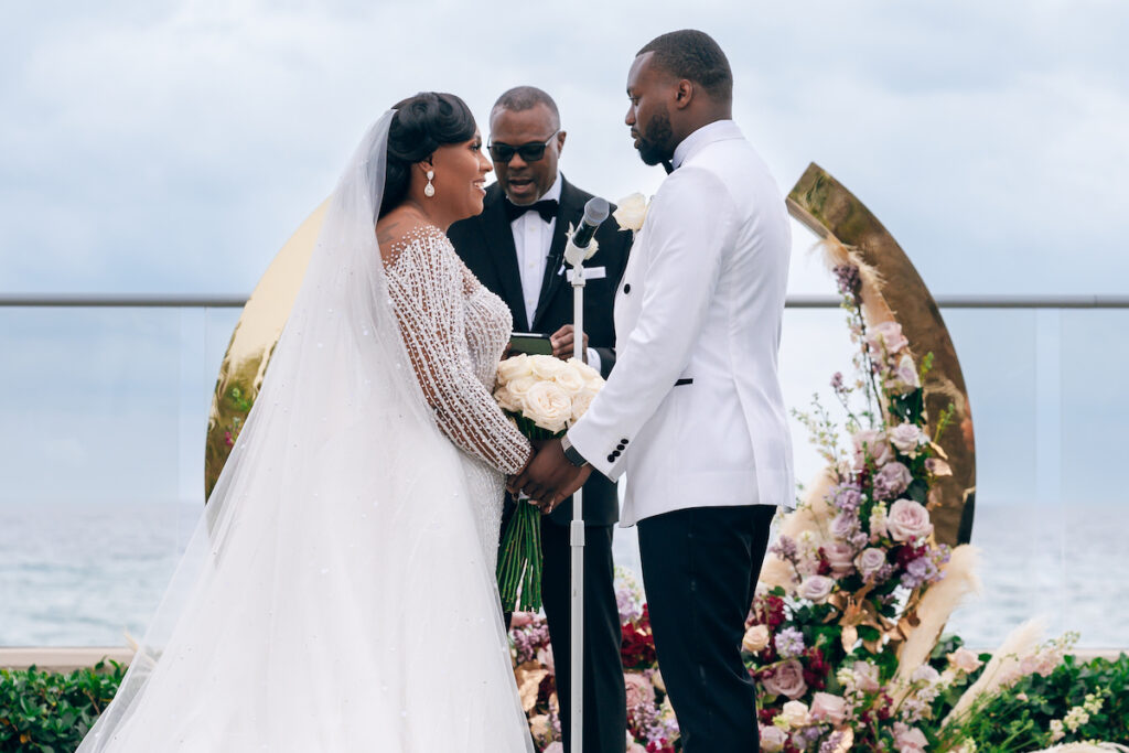 Featured in MunaLuchi Bride, Issue 28, Crystal & Joshua Foster said I-do in a glamorous royal-inspired wedding week at The Breakers.