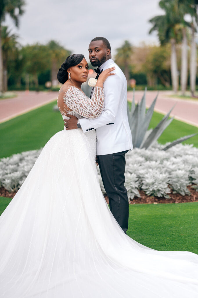 Featured in MunaLuchi Bride, Issue 28, Crystal & Joshua Foster said I-do in a glamorous royal-inspired wedding week at The Breakers.