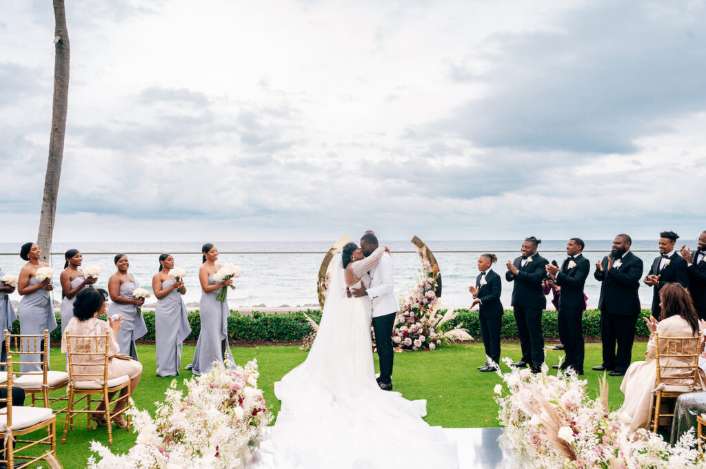 Featured in MunaLuchi Bride, Issue 28, Crystal & Joshua Foster said I-do in a glamorous royal-inspired wedding week at The Breakers.